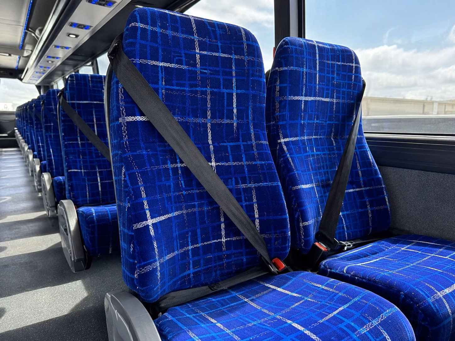 detroit 56 passenger charter bus rental
