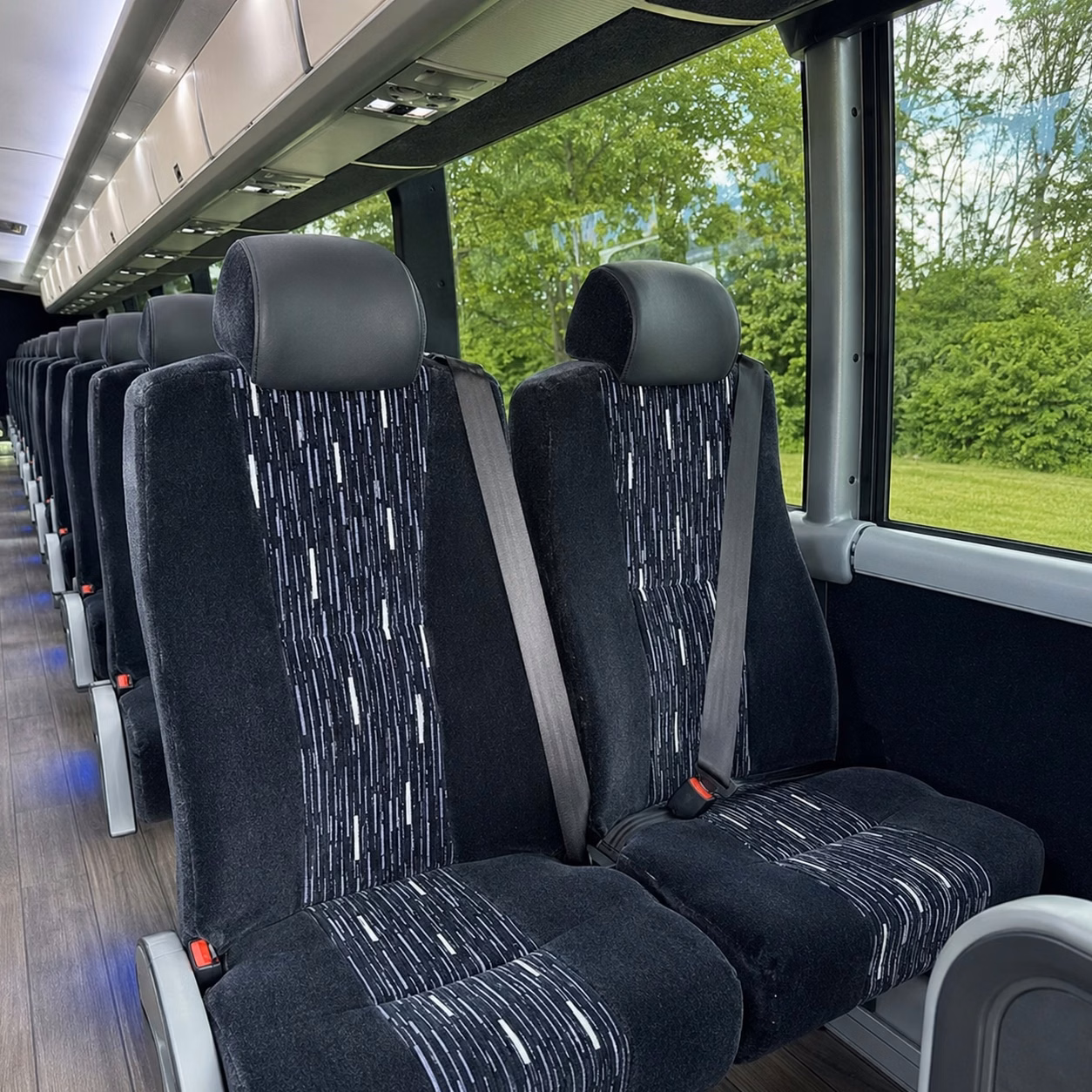 how trip distance and duration affect detroit charter bus rental rates